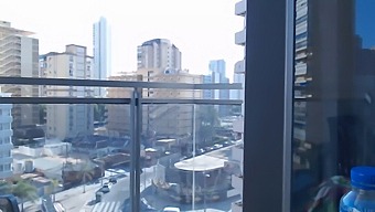 Sexy Gamer Girl Dressed Shows Off On Balcony Outside